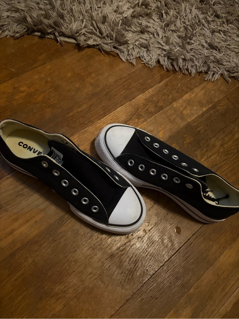 Converse Womens Black Slip-On Canvas Sneakers with White Toe Cap